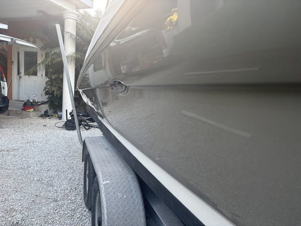 Dark grey Sea Ray on a trailer